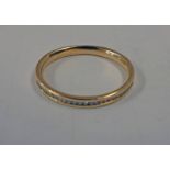 18CT GOLD DIAMOND SET ETERNITY RING - 2.5 G Condition Report: Ring size: O.