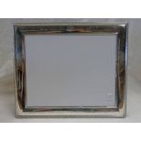 SILVER PHOTO FRAME WITH DECORATIVE BORDER, SHEFFIELD 1983.