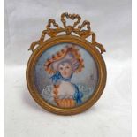 GILT FRAMED PORTRAIT MINIATURE IN AN EASEL STAND OF A LADY IN A SUMMER HAT INITIALED J M