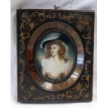 BRASS OVERLAID FRAMED PORTRAIT MINIATURE OF A LADY IN A PINK & WHITE DRESS, INDISTINCTLY SIGNED - 7.