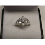 9 CARAT GOLD DIAMOND SET CLUSTER RING