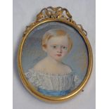 OVAL 19TH CENTURY MINIATURE OF YOUNG GIRL WITH GINGER HAIR IN GILT FRAME
