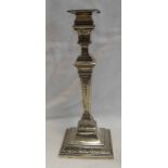 SILVER FLORAL DECORATED CANDLESTICK ON SQUARE BASE,