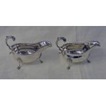 PAIR OF EDWARDIAN SILVER SAUCE BOATS WITH SCROLL HANDLES & BEAD WORK BORDERS,