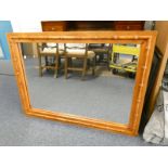 OAK FRAMED OVERMANTLE MIRROR WITH DECORATIVE CARVED FRAME,