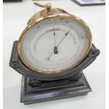 BRASS CASED HOLOSTERIC BAROMETER BY HPBN ON A CARVED STAND