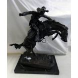 AFTER FREDERIC REMINGTON - THE BRONCO BUSTER (SMALL VERSION) ON A BLACK MARBLE PLINTH BASE