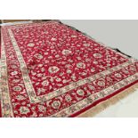 FULL PILE RED GROUND CASHMERE CARPET WITH ALL OVER FLORAL PATTERN 300 X 195CM