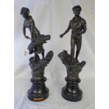 2 METAL FIGURES ON CIRCULAR WOODEN BASES DEPICTING HARVESTING MAN & WOMAN,