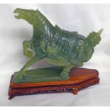 CHINESE GREEN HARDSTONE REARING HORSE WITH SADDLE ON PLINTH BASE WITH HARDWOOD STAND - 25 CM LONG