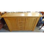 OAK SIDEBOARD WITH 2 PANEL DOORS & 8 DRAWERS,