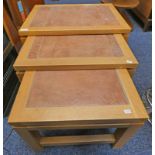 NEST OF 3 OAK TABLES WITH TILE INSET TOPS ON SQUARE SUPPORTS