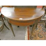 LATE 19TH CENTURY MAHOGANY FLIP TOP GAMES TABLE WITH DECORATIVE BOXWOOD INLAY ON SQUARE TAPERED