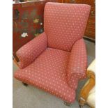 EARLY 20TH CENTURY OVERSTUFFED ARMCHAIR WITH RED & GOLD PATTERN ON SQUARE SUPPORTS