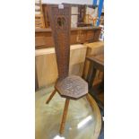 MAHOGANY SPINNING CHAIR WITH DECORATIVE CARVING AND POKER WORK ON TURNED SUPPORTS