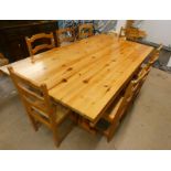 PINE RECTANGULAR KITCHEN TABLE AND SET OF 8 PINE LADDER BACK CHAIRS WITH RUSH SEATS ON SQUARE