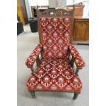 LATE 19TH CENTURY OAK OPEN ARMCHAIR ON TURNED SUPPORTS