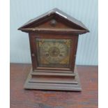 EARLY 20TH CENTURY OAK MANTLE CLOCK WITH BRASS & SILVERED DIAL
