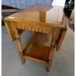 OAK DROP LEAF TABLE WITH UNDERSHELF ON TURNED SUPPORTS 66CM LONG