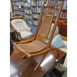 MAHOGANY FRAMED FOLDING CHILD'S CHAIR WITH CANE WORK BACK AND SEAT