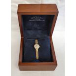 9CT GOLD ROTARY LADIES WRISTWATCH ON A 9CT GOLD BRACELET, BOXED - 14.