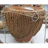 AFRICAN TRIBAL DRUM WITH HIDE TOP AND FIBRE BOUND BODY,