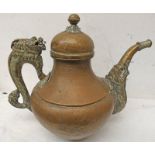 MIDDLE EASTERN BRASS KETTLE WITH HEAVILY DECORATED ELEPHANT HEAD SPOUT & A BEAST HANDLE WITH WHITE