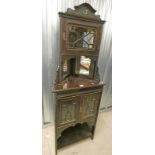 MAHOGANY CORNER CABINET WITH MIRROR BACK OVER TWO GLAZED PANEL DOOR AND GLAZED PANEL DOOR ABOVE