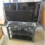 PANASONIC 40" TELEVISION AND 3 TIER GLASS TELEVISION STAND Condition Report: The