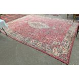 LARGE RED GROUND FLORAL DECORATED CARPET 441 CM X 354 CM