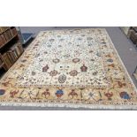 GOLD AND CREAM FLORAL DECORATED CARPET 350 CM X 276 CM Condition Report: Overall