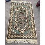 GREEN & BEIGE FLORAL DECORATED RUG,