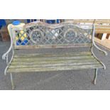 GARDEN BENCH WITH WROUGHT METAL ENDS AND DECORATION TO BACK