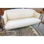 19TH CENTURY STYLE MAHOGANY FRAMED SETTEE ON REEDED SUPPORTS,