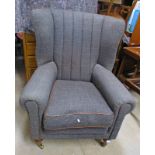 HARRIS TWEED OVERSTUFFED WINGBACK ARMCHAIR ON TURNED MAHOGANY SUPPORTS Condition Report: