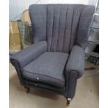 HARRIS TWEED OVERSTUFFED WINGBACK ARMCHAIR ON TURNED MAHOGANY SUPPORTS Condition Report: