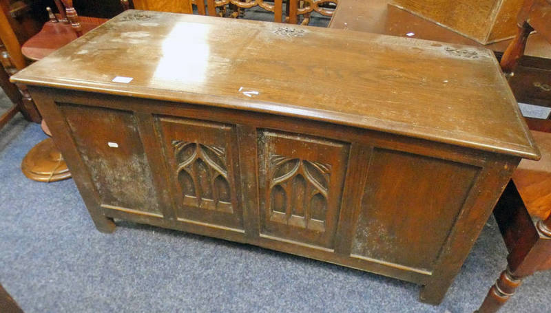 19TH CENTURY STYLE CARVED OAK COFFER ON SQUARE SUPPORTS,