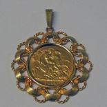 9CT GOLD MOUNTED 1914 HALF SOVEREIGN PENDANT - 6.