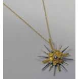 GOLD DIAMOND SET SUNBURST PENDANT - 6.