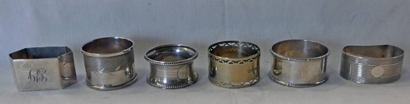 6 VARIOUS SILVER NAPKIN RINGS - 120 G