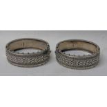 PAIR OF VICTORIAN SILVER HINGED BANGLES WITH DECORATIVE FRONTS BY ROBERT JAMES DICK,