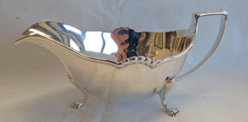 SILVER SAUCE BOAT ON PAW FEET, RETAILED BY HARRODS,