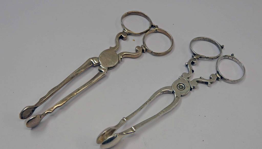 PAIR OF 18TH CENTURY SILVER SUGAR NIPS,