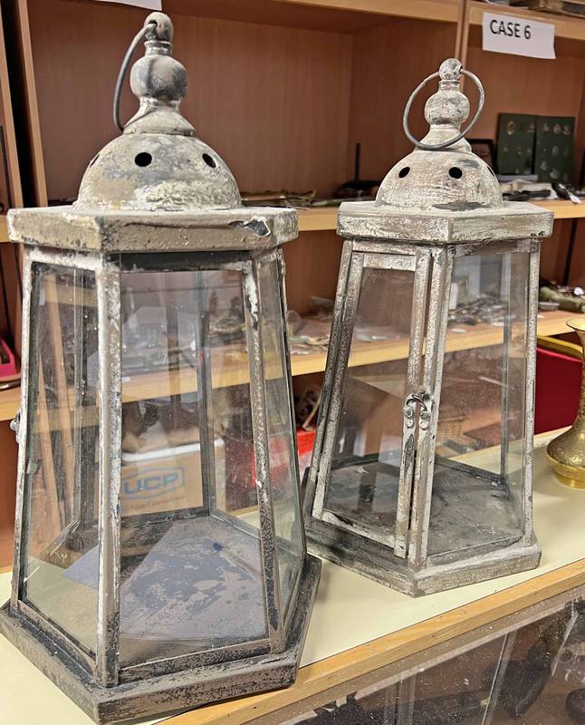 PAIR OF METAL AND GLASS LANTERNS 46CM TALL Condition Report: All glass panels are