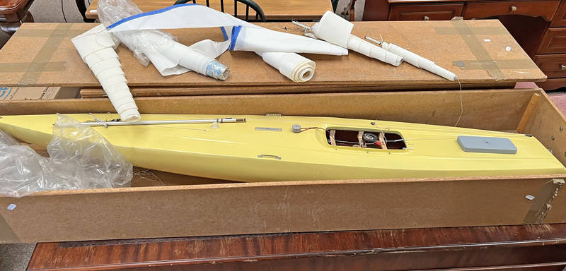 MODEL POND YACHT, YELLOW, WITH SAILS IN CUSTOM MADE WOODEN TRANSPORT CASE,