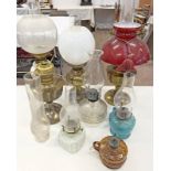 SELECTION OF PARAFFIN LAMPS WITH SHADES ETC