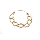 A horseshoe motif bracelet, stamped '9' and '.375', length 20cmCondition report: Gross weight 13.5