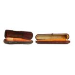 An amber cigar holder with a 9 carat gold mount and another example (2)Condition report: Gross