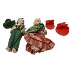 A pair of mid 20th century Lenci dolls with pottery shoulder head mounts, with moulded hair and