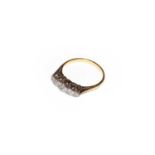 An 18 carat gold diamond five stone ring, finger size N1/2Condition report: Gross weight 3.0 grams.